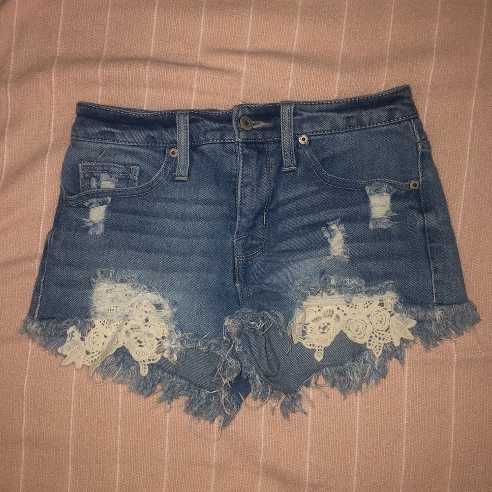 Ripped lacy jean shorts